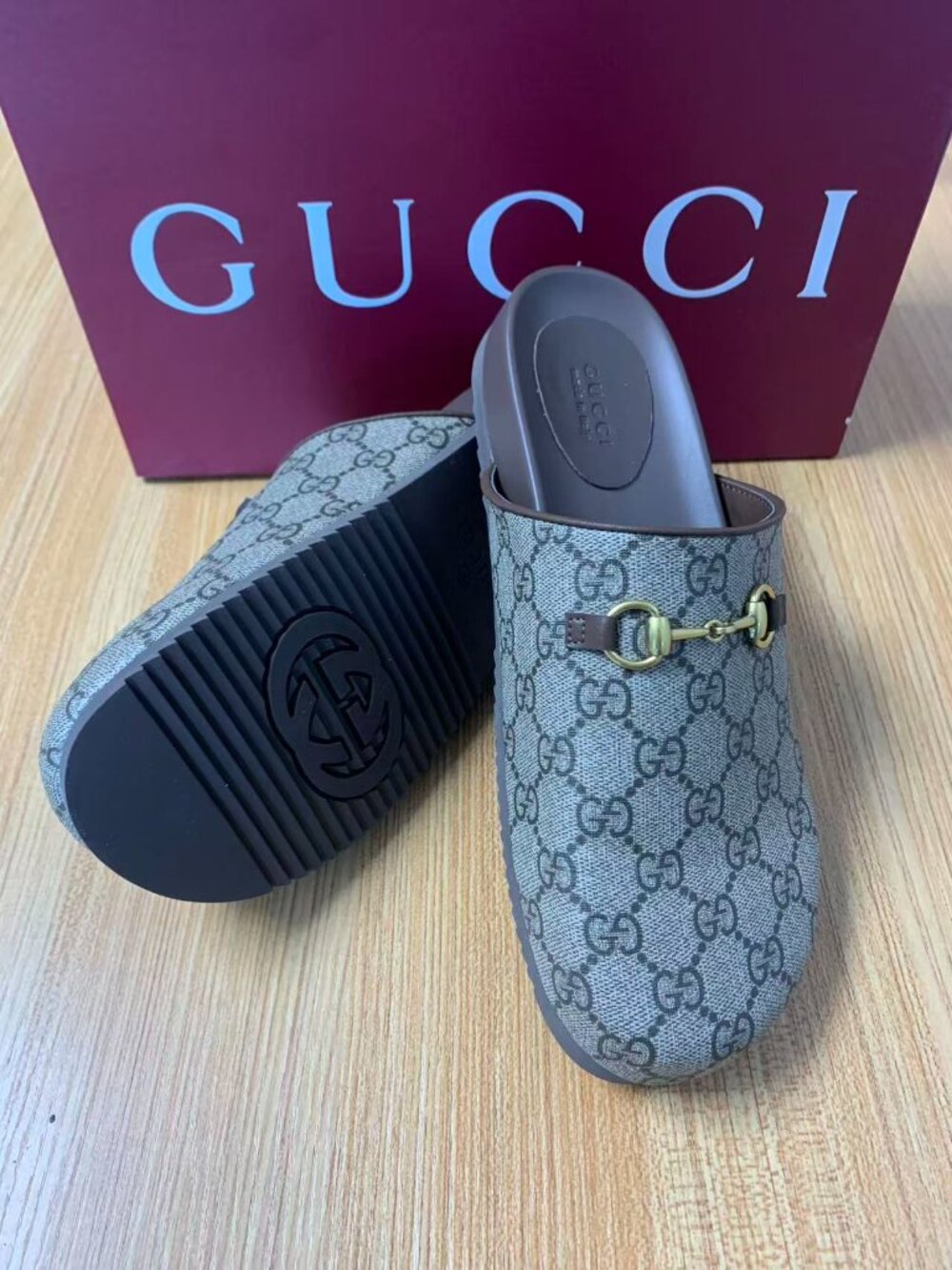 Gucci Brown Monogram Slides with Gold Accent